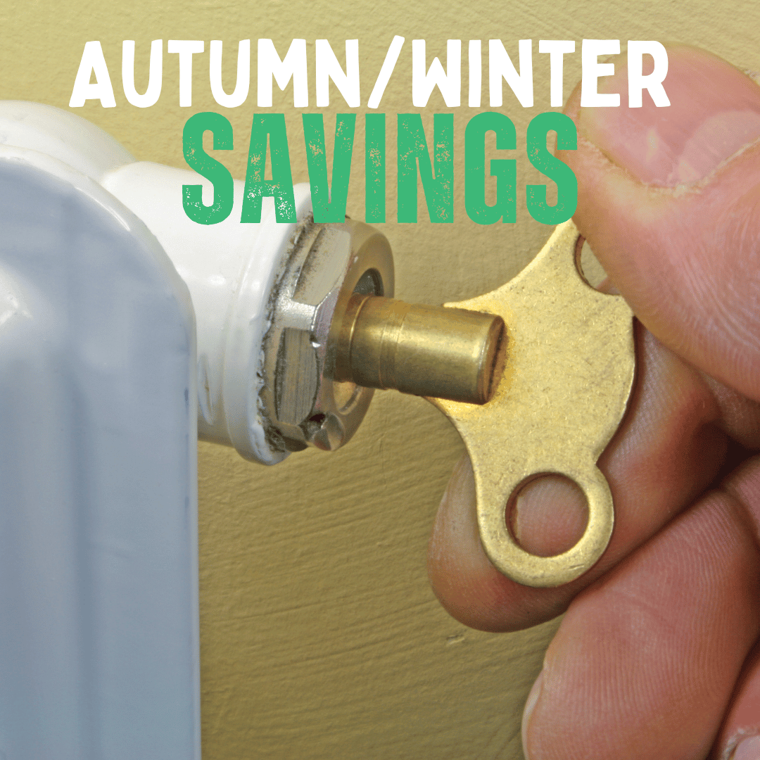 fingers bleeding a radiator with a key