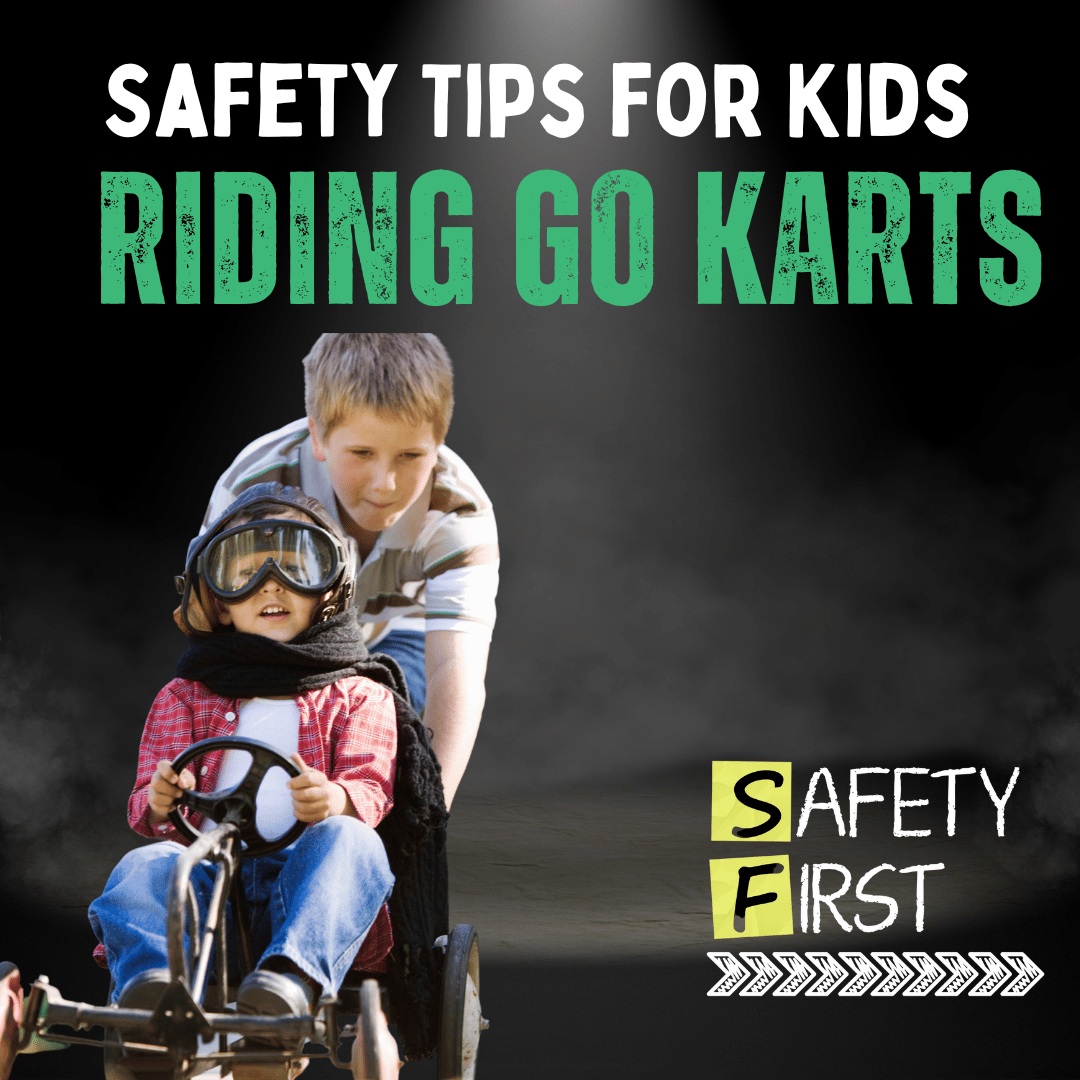 One kid pushing another kid on a go kart