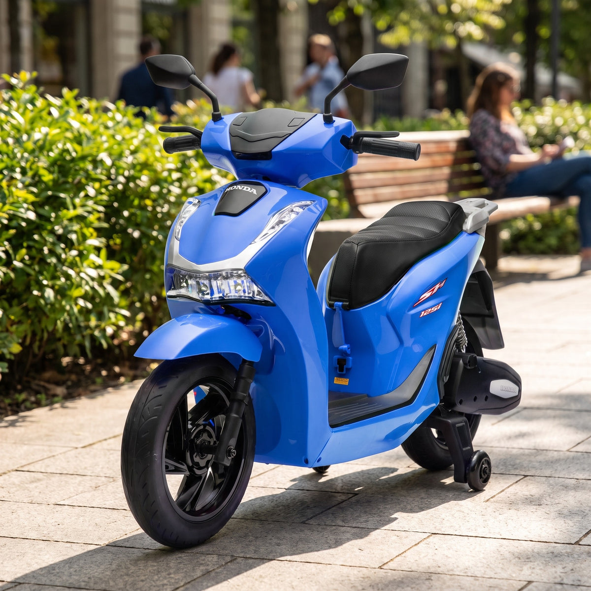 08-licensed-honda-sh125i-24v-kids-electric-ride-on-scooter-blue-garden-lifestyle.jpg
