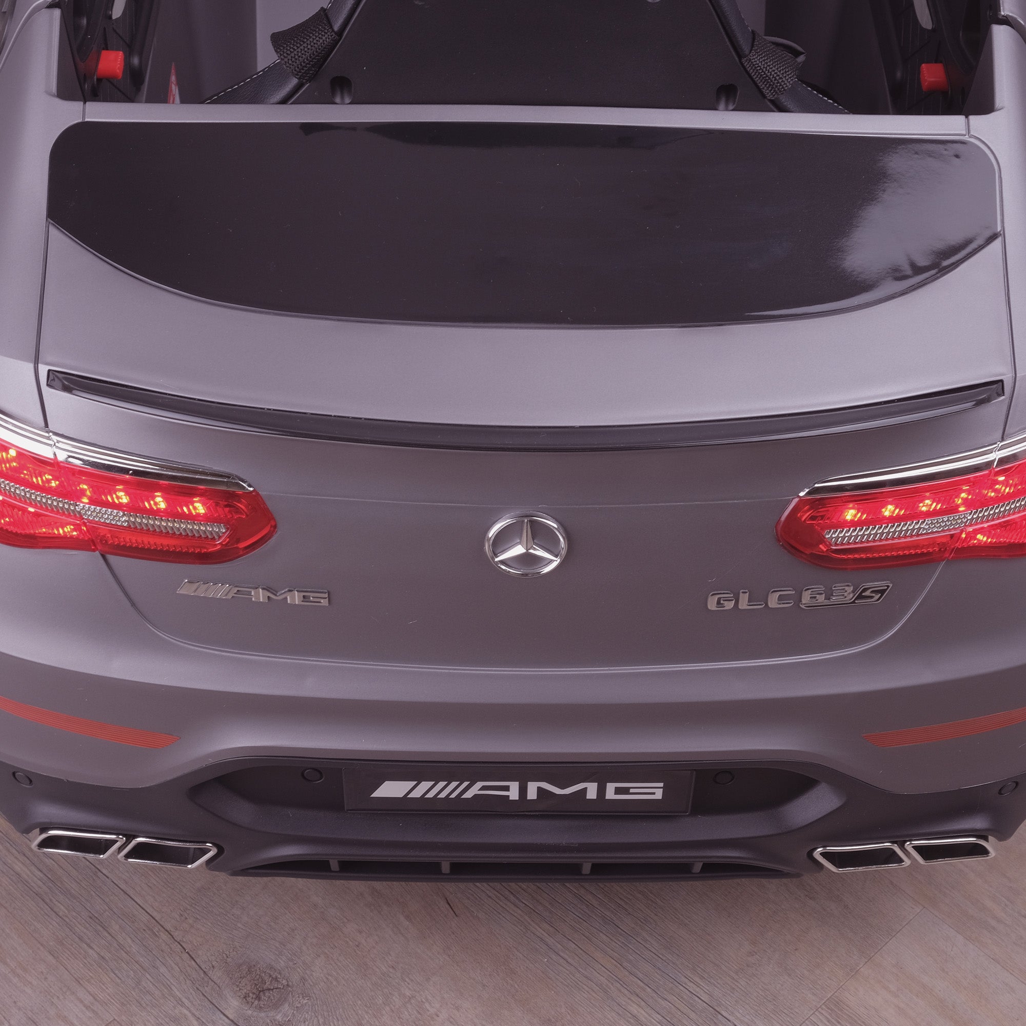 kids 12v electric mercedes glc 63s coupe battery car jeep pick up battery operated ride on car with parental remote control mat gray rear top angle benz amg licensed 2wd