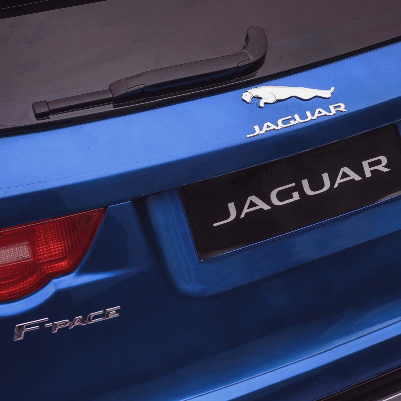 kids electric ride on jaguar f pace licensed battery operated car with parental remote control 12v rear blue