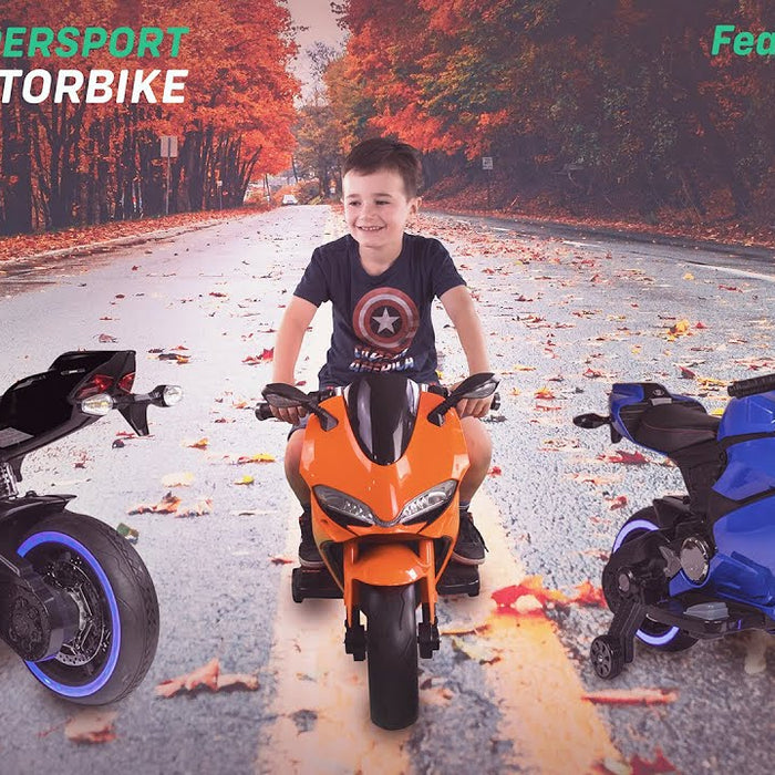 young boy sitting on ride on Ducati Style Motorbike
