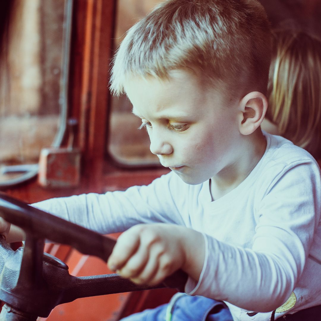 Teaching Responsibility Through Ride-On Tractor Play