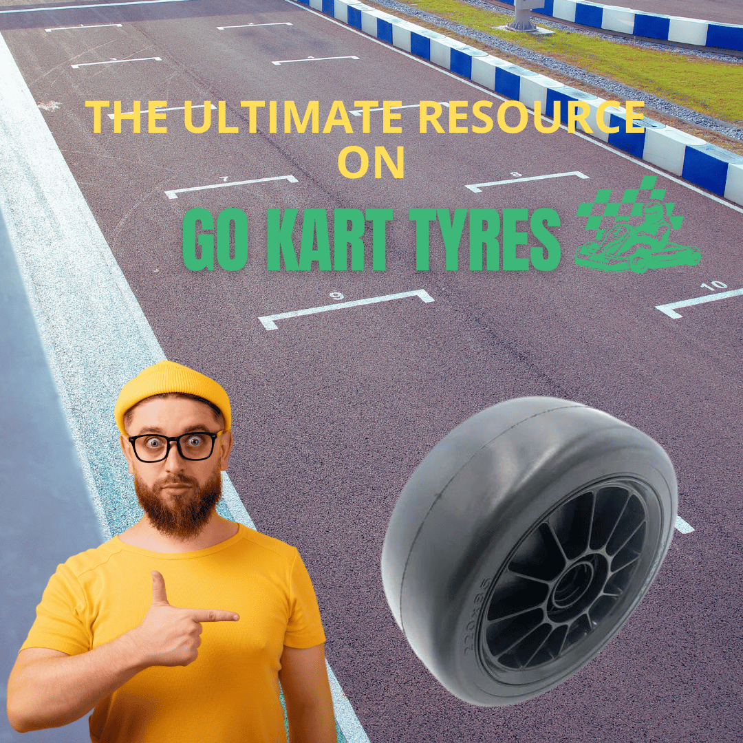 a man in a yellow top and hat pointing at a go kart tyre