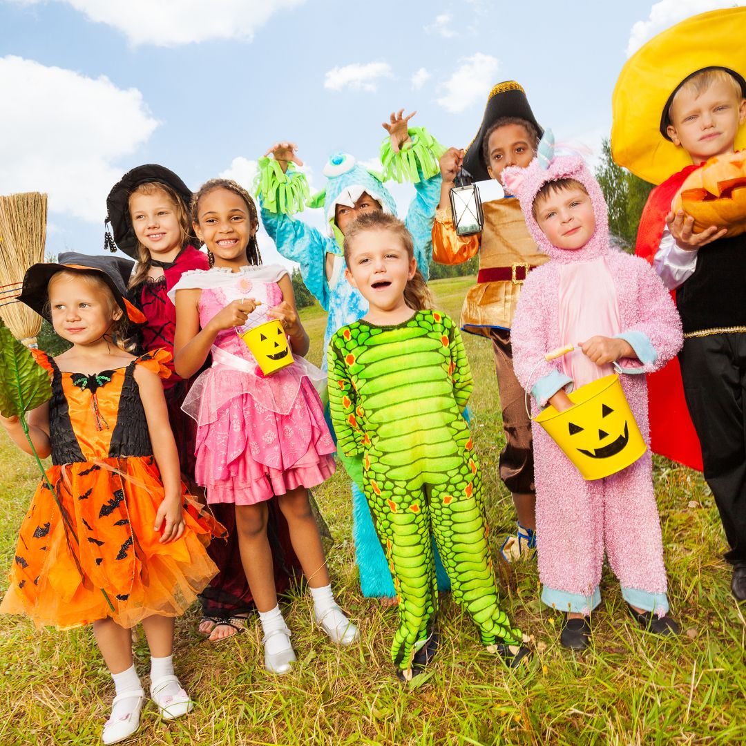 kids dressed in halloween costumes