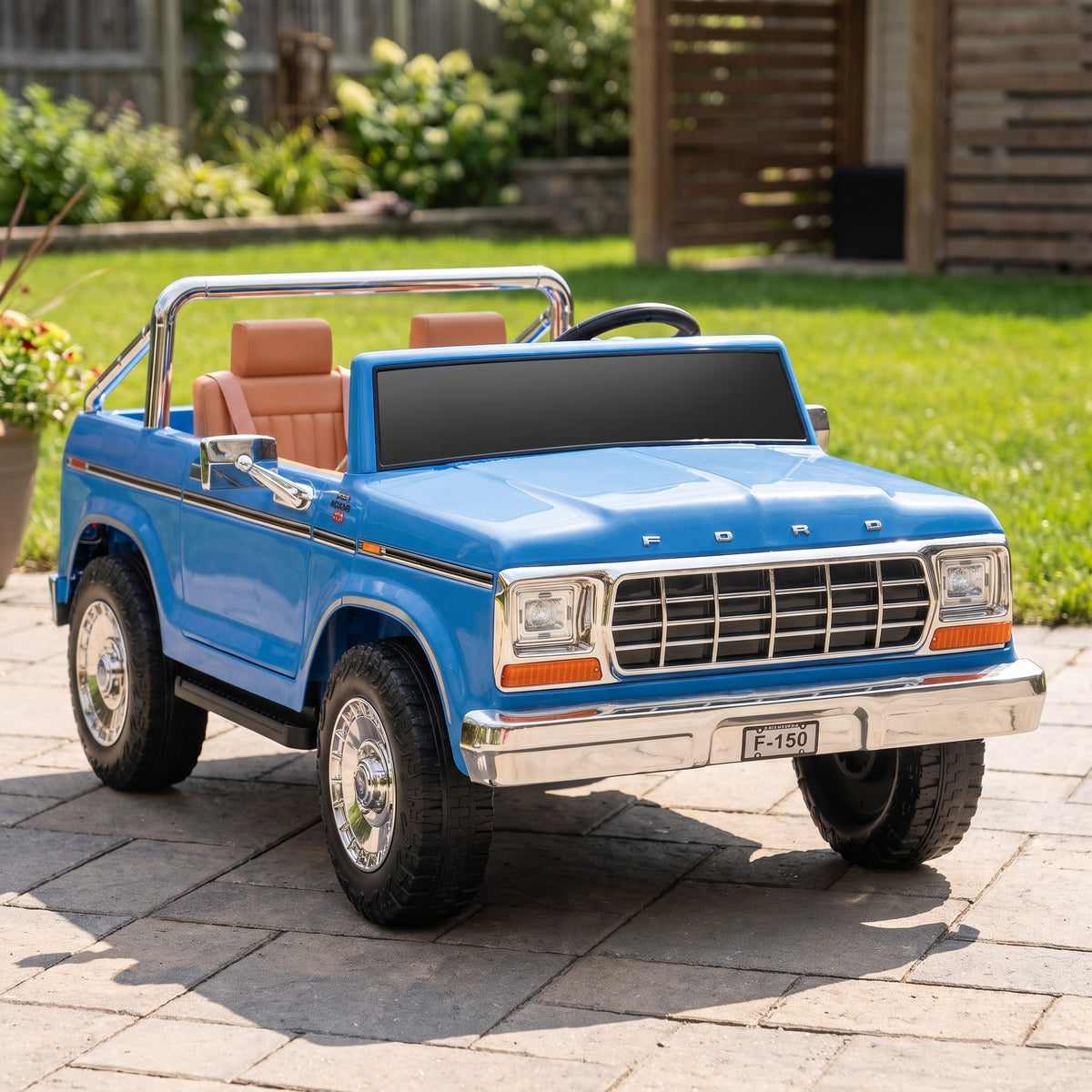 07-licensed-ford-f-150-12v-kids-electric-ride-on-pickup-truck-blue-garden-lifestyle.jpg