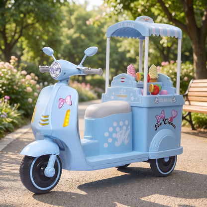 07-sweetscoops-12v-kids-ice-cream-ride-on-scooter-blue-garden-lifestyle.jpg