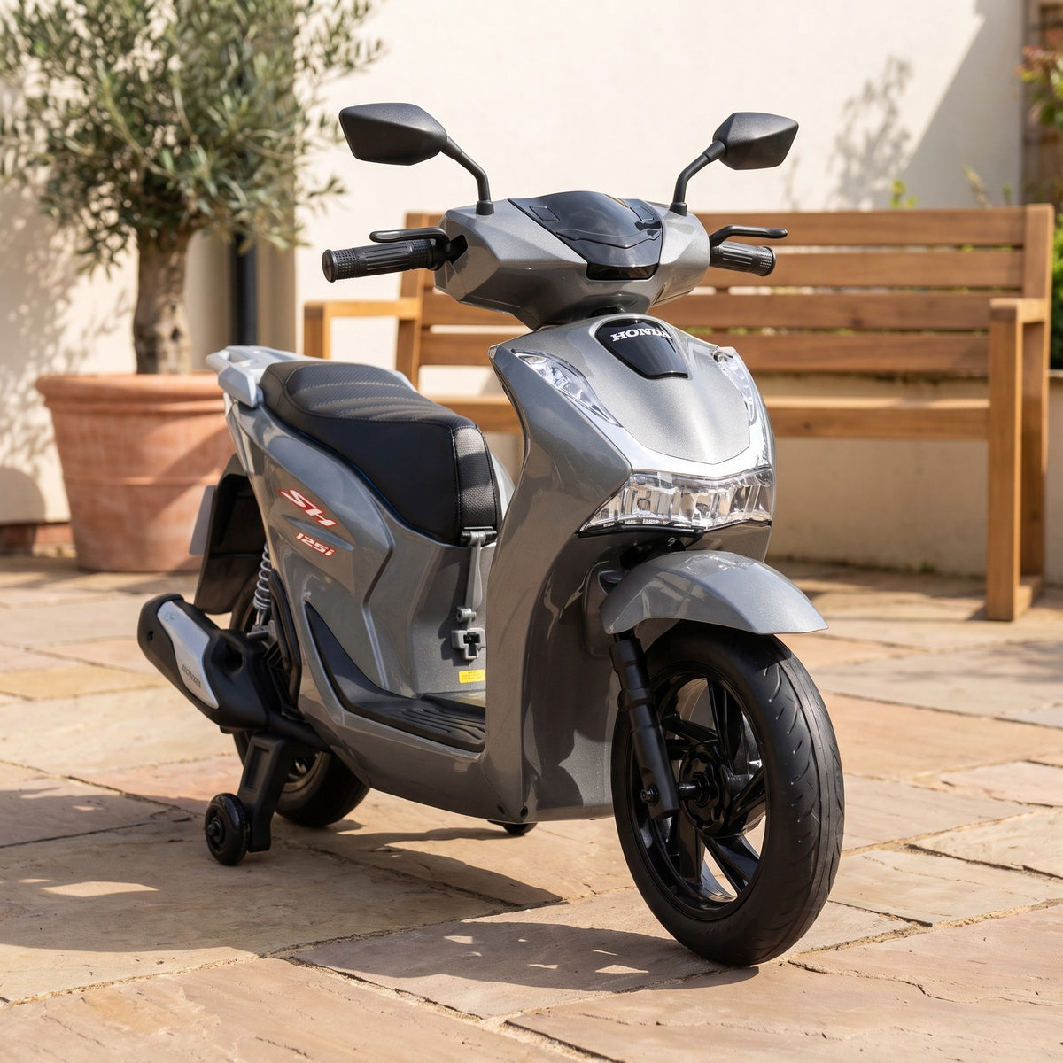 08-licensed-honda-sh125i-24v-kids-electric-ride-on-scooter-grey-garden-lifestyle.jpg