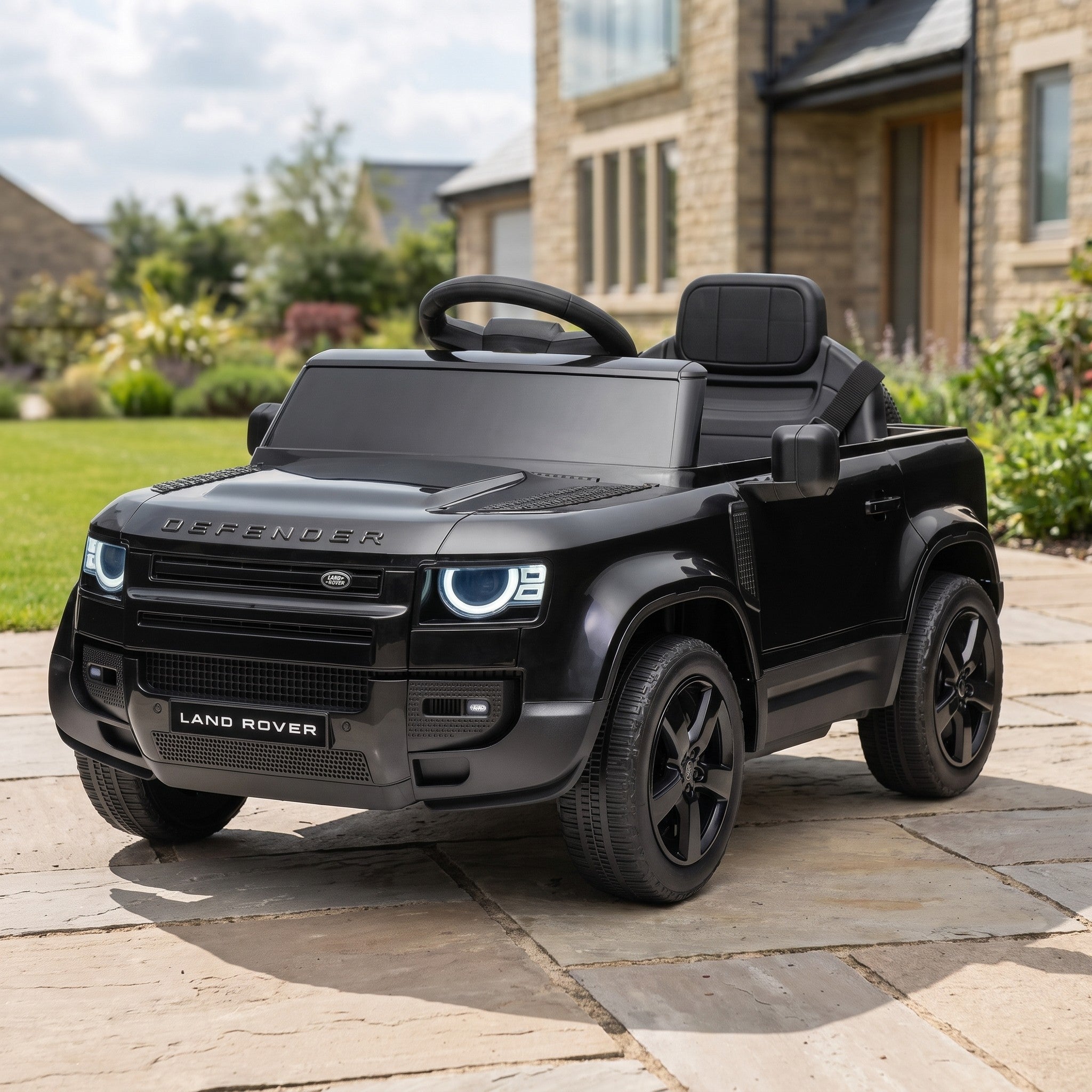 08-licensed-land-rover-defender-2025-12v-kids-electric-ride-on-car-black-garden-lifestyle.jpg