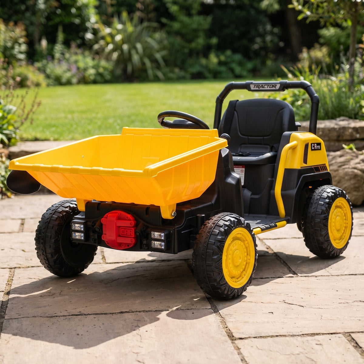 08-powerhaul-12v-kids-electric-ride-on-dumper-truck-yellow-garden-lifestyle.jpg